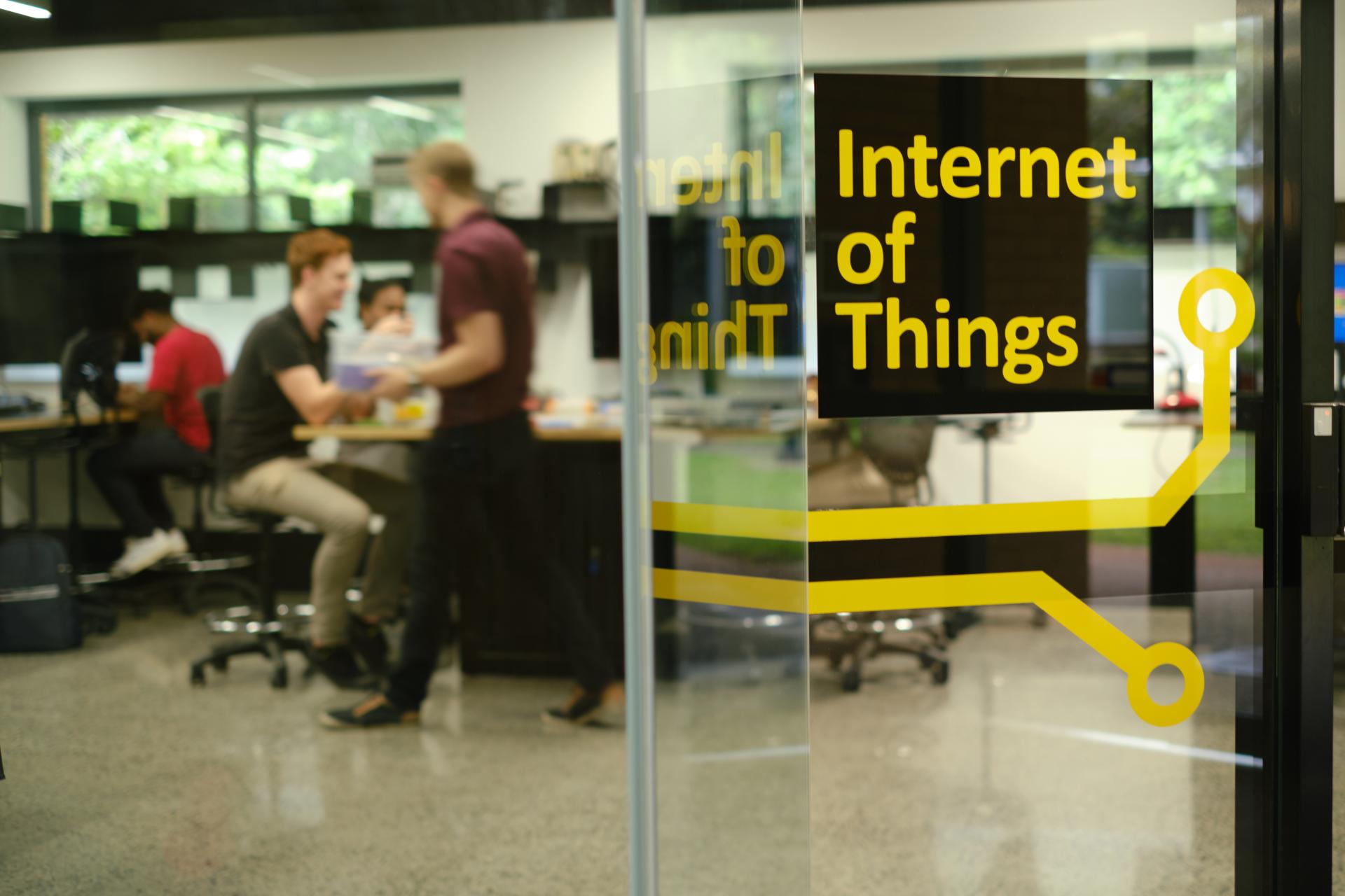 Students working in an IoT lab. 