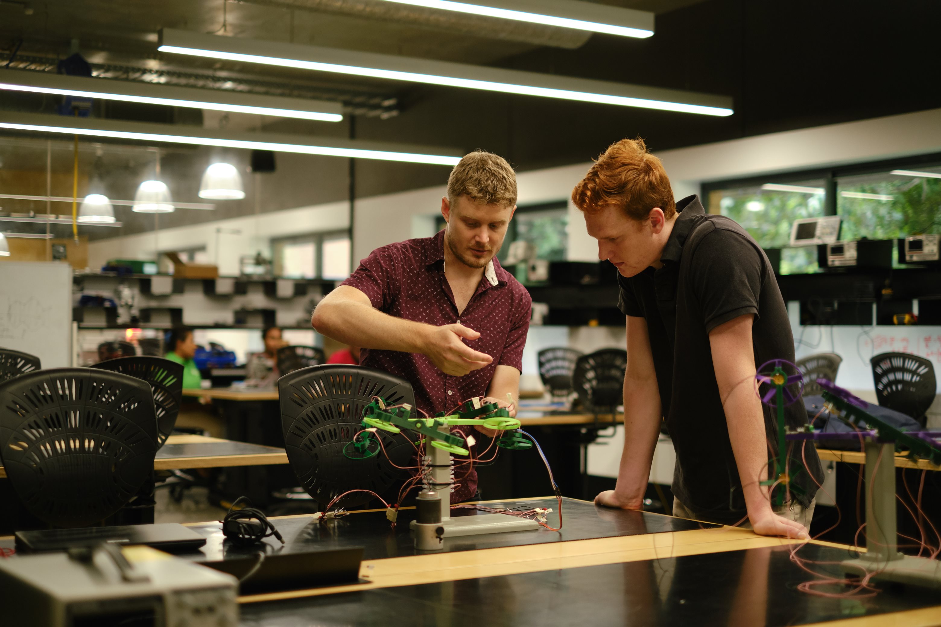 Two engineers working in an Internet of Things lab. 