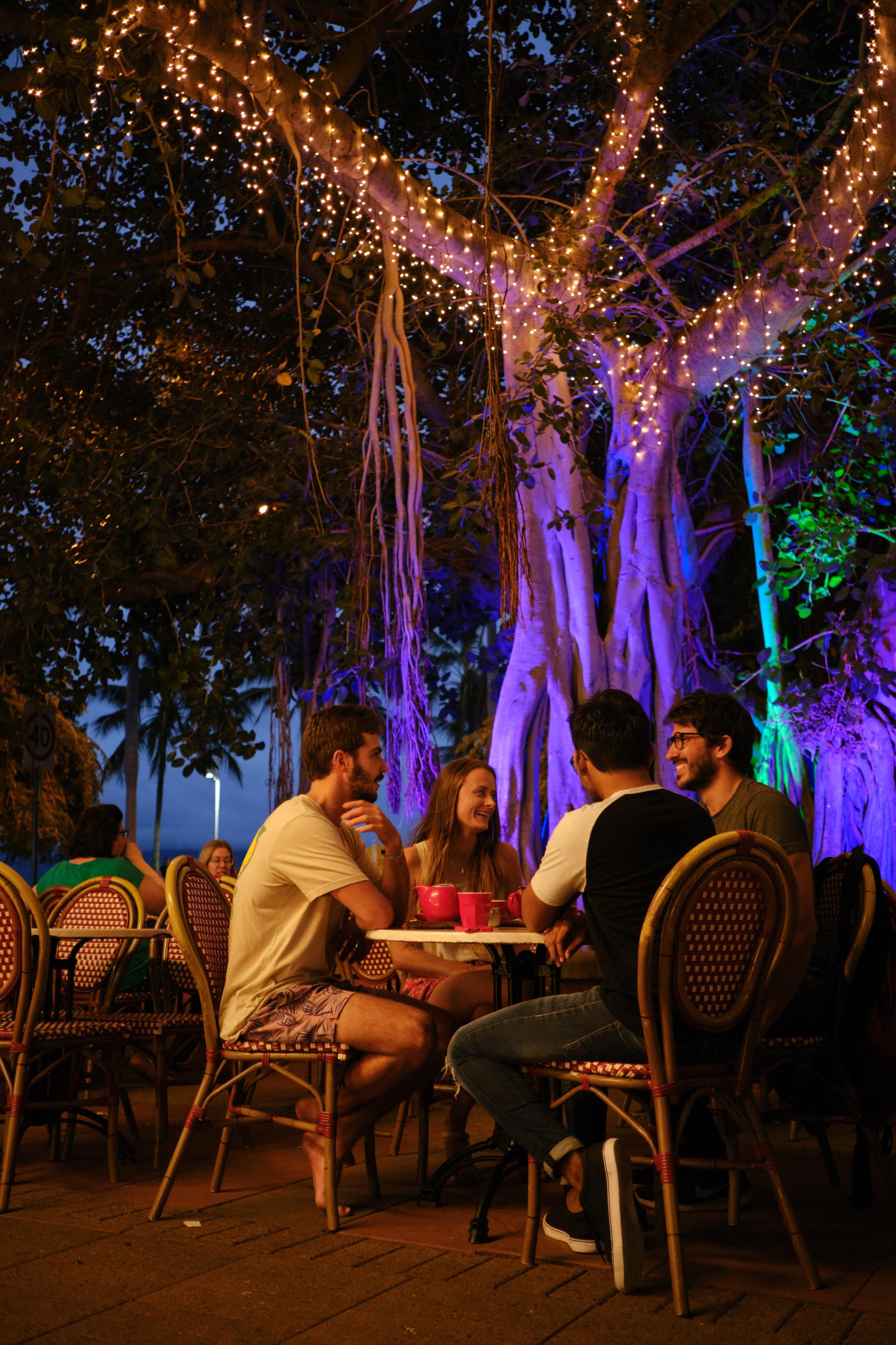 A group of students dining together at a restaurant. 